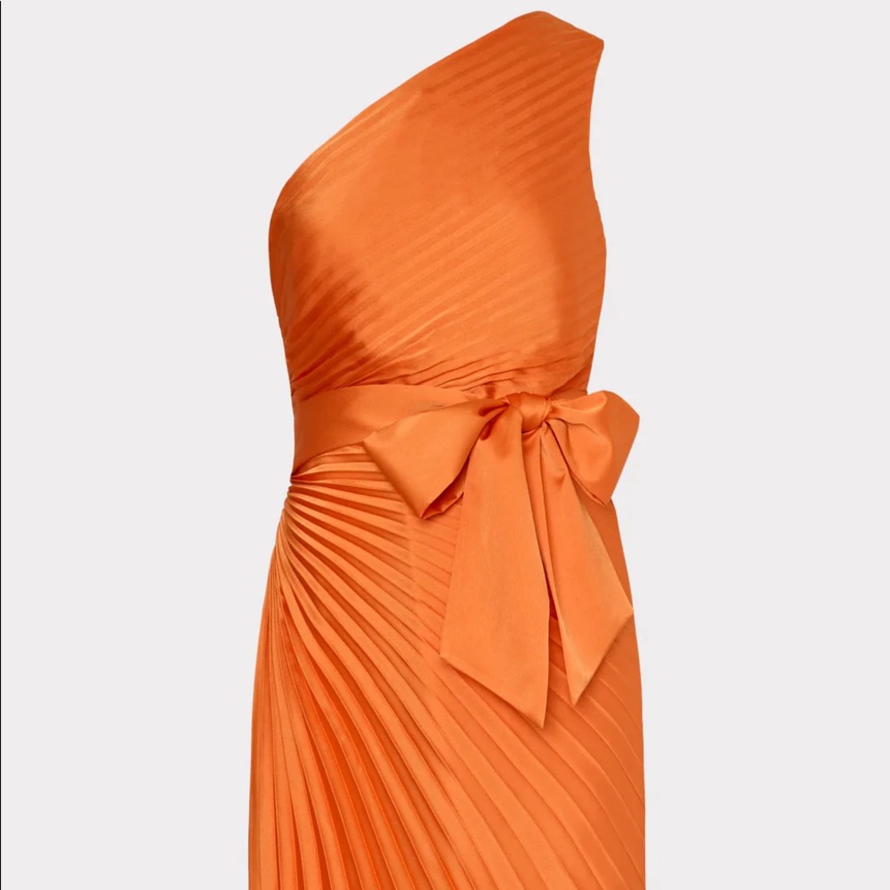 bought for a cocktail party never worn. stunning on too bad it did not fit me